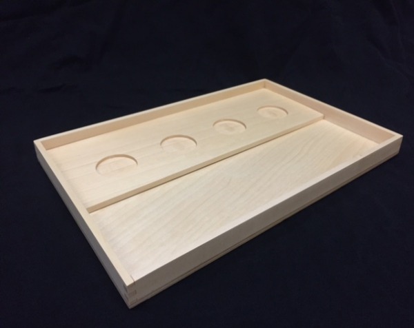 Custom wooden liquor display tray with cutouts, designed for bulk orders in retail displays, branding, and promotional packaging.